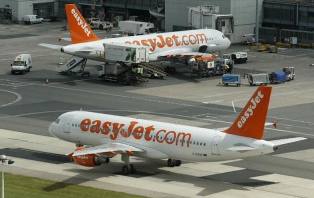 an easy jet airbus a320 aircraft taxis across the tarmac at manchester airport at manchester airport northern england june 25 2013 photo reuters an easy jet airbus a320 aircraft taxis across the tarmac at manchester airport at manchester airport northern england june 25 2013 photo reuters