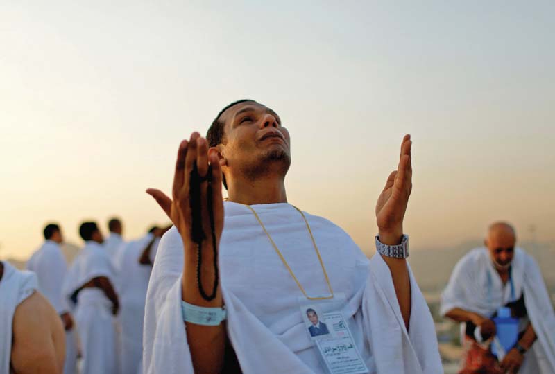 a pilgrim prays on mount arafat outside makkah during hajj photo reuters