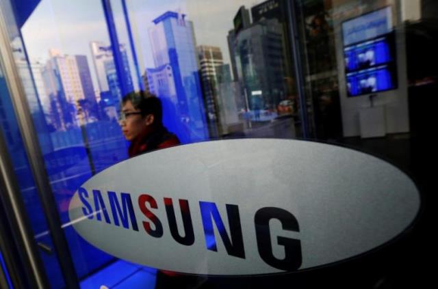 samsung to sell its printer unit to hp photo reuters