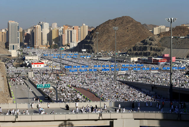 muslim pilgrims walk on roads as they head to cast stones at pillars symbolising satan during the annual hajj pilgrimage in mina on the first day of eidul azha near the holy city of makkah saudi arabia september 12 2016 photo reuters