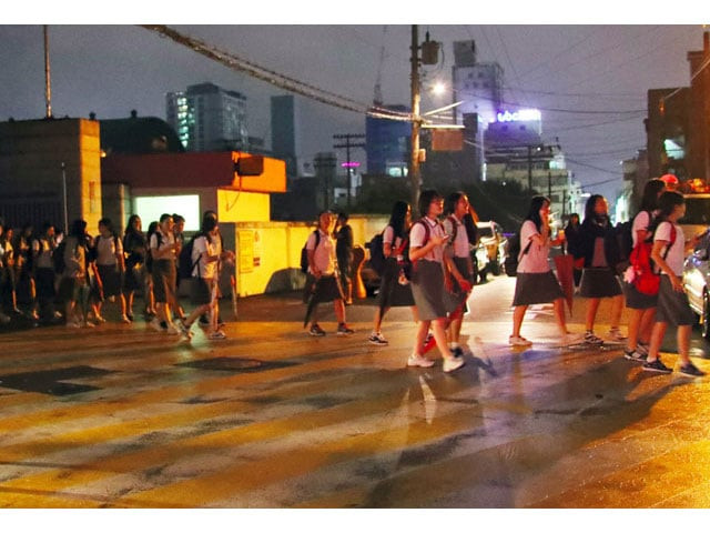 south korean high school students leave their school after an earthquake in ulsan about 300 kms southeast of seoul on september 12 2016 photo afp