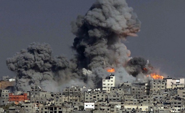 smoke billows following an israeli missile strike in gaza photo afp