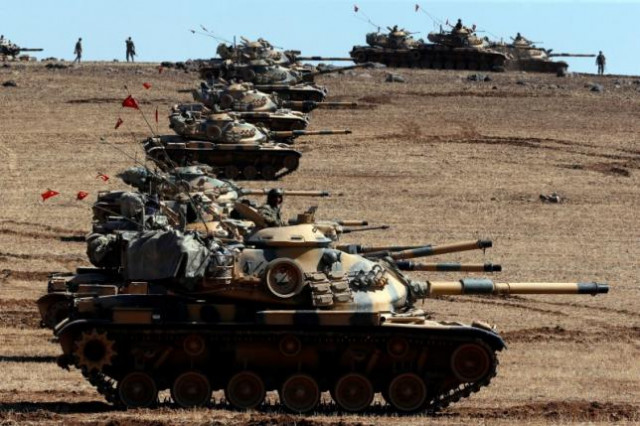 turkish army tanks take up position on the turkish syrian border near the southeastern town of suruc in sanliurfa province october 6 2014 photo reuters turkish army tanks take up position on the turkish syrian border near the southeastern town of suruc in sanliurfa province october 6 2014 photo reuters