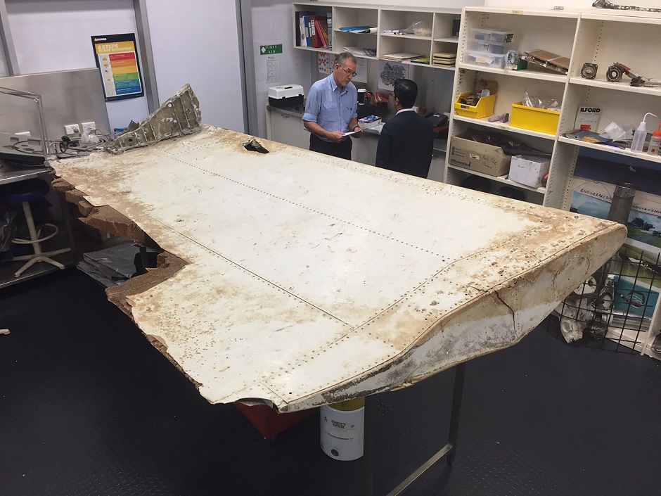 a large piece of debris found in tanzania recently which has been confirmed as a part of a wing flap from missing malaysia airlines passenger jet mh370 photo afp