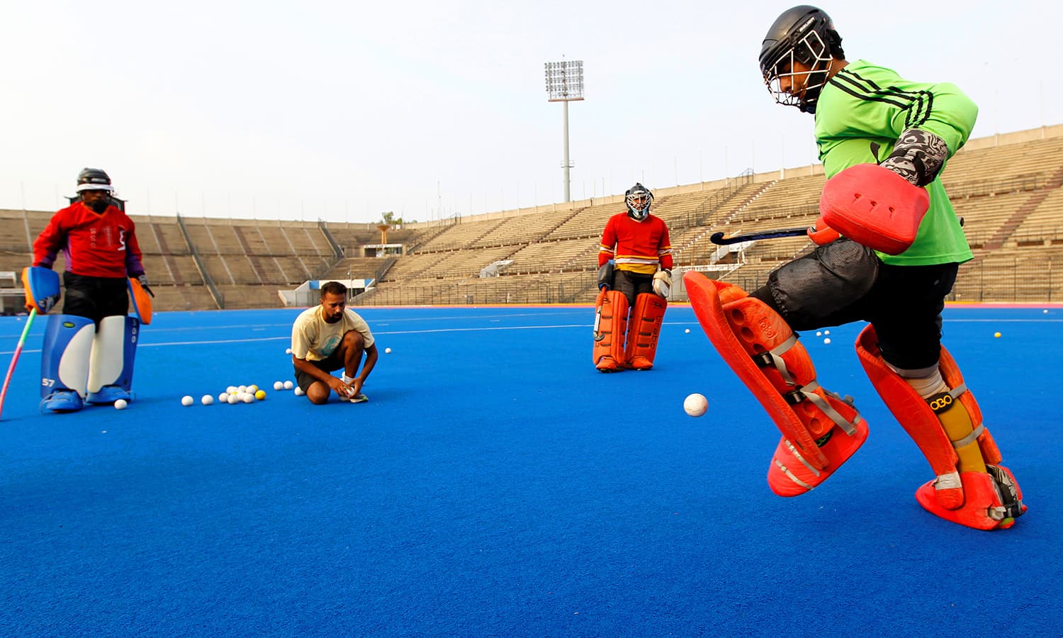 hockey players train at the gaddafi stadium in lahore pakistan photo reuters