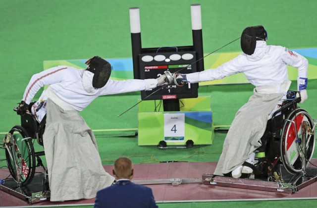 combatants must remain seated in wheelchairs attached to the floor largely immobilising their lower bodies whether the athletes legs are paralysed or not photo reuters combatants must remain seated in wheelchairs attached to the floor largely immobilising their lower bodies whether the athletes legs are paralysed or not photo reuters