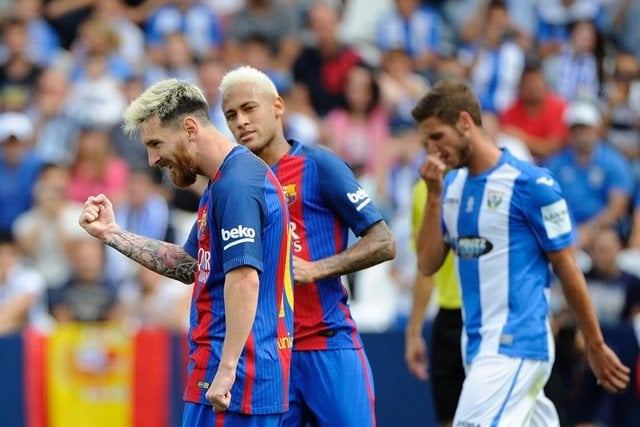 barcelona 039 s argentinian forward lionel messi l celebrates past barcelona 039 s brazilian forward neymar after scoring a penalty during the spanish league football match photo afp