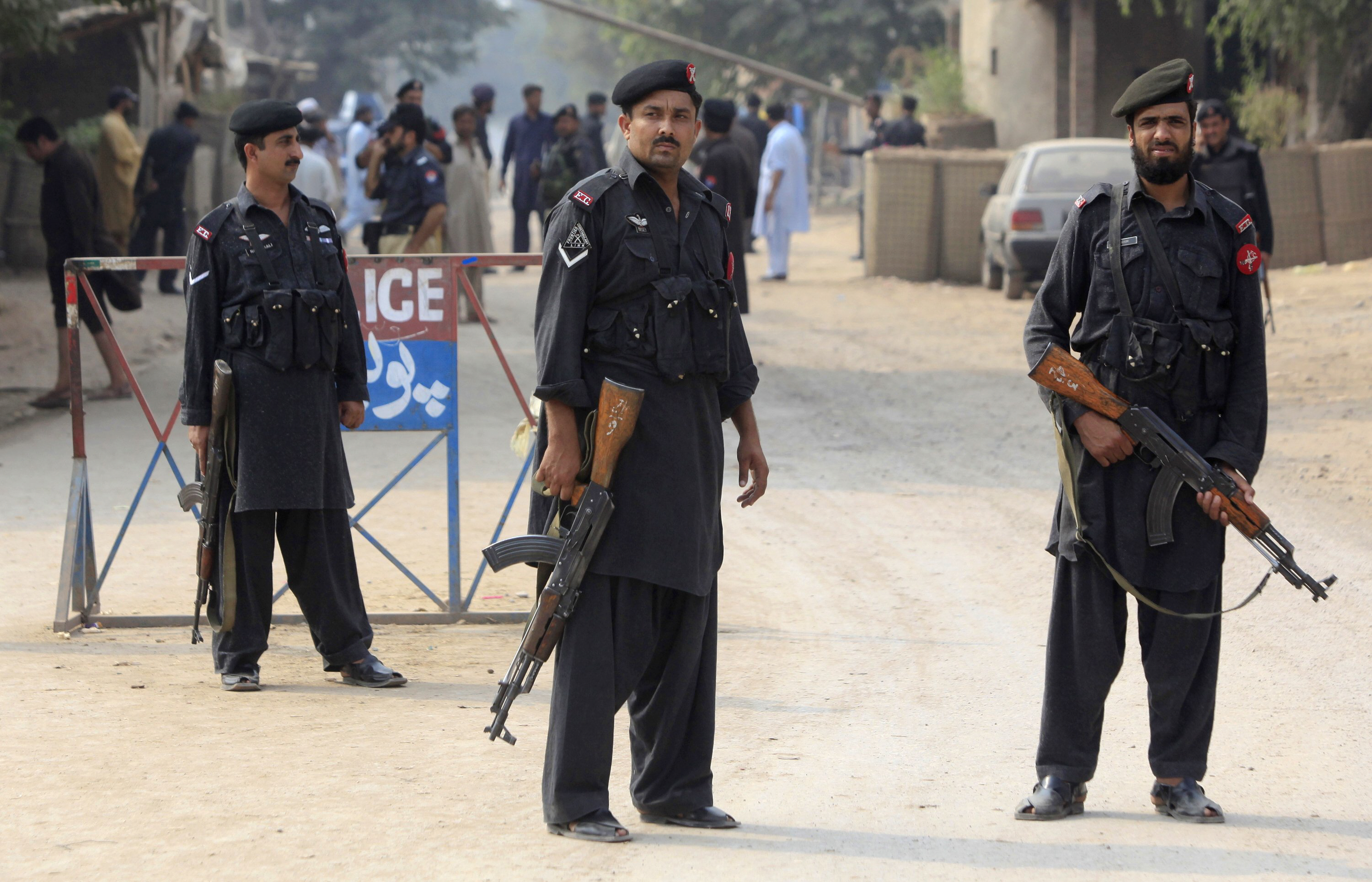 police stand guard near a barricade on a road in the khyber pakhtunkhwa province photo reuters file