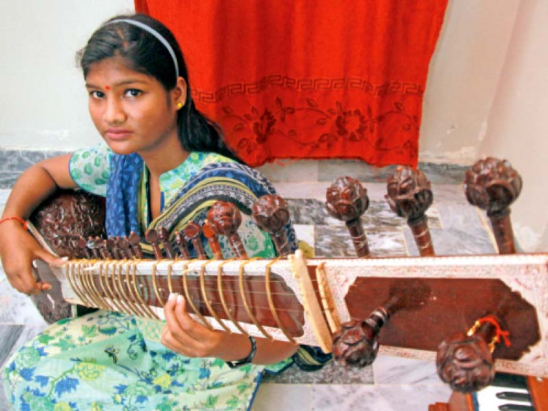 the young sitar player takes two classes a week from ustad rais khan on saturday and sunday between 2pm and 6pm at his residence in bahadurabad photo athar khan express