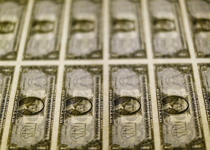 united states one dollar bills are seen on a light table at the bureau of engraving and printing in washington november 14 2014 photo reuters