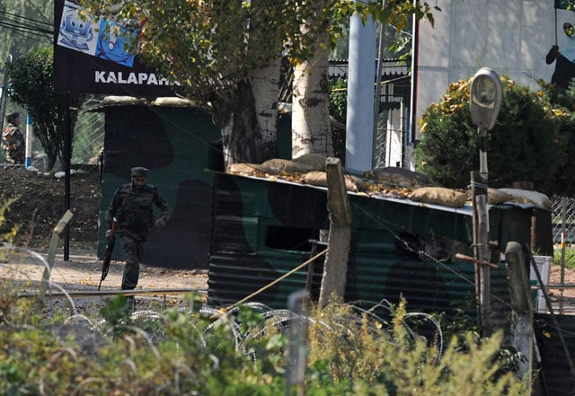 an indian army soldier runs through an army brigade headquarters during a gunbattle there between indian army soldiers and rebels near the border with pakistan known as the line of control loc in uri on september 18 2016 photo afp an indian army soldier runs through an army brigade headquarters during a gunbattle there between indian army soldiers and rebels near the border with pakistan known as the line of control loc in uri on september 18 2016 photo afp