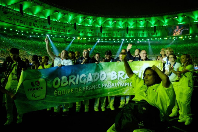 athletes from france hold a banner with quot thank you brazil quot written during the closing ceremony of the 2016 paralympic games photo afp athletes from france hold a banner with quot thank you brazil quot written during the closing ceremony of the 2016 paralympic games photo afp