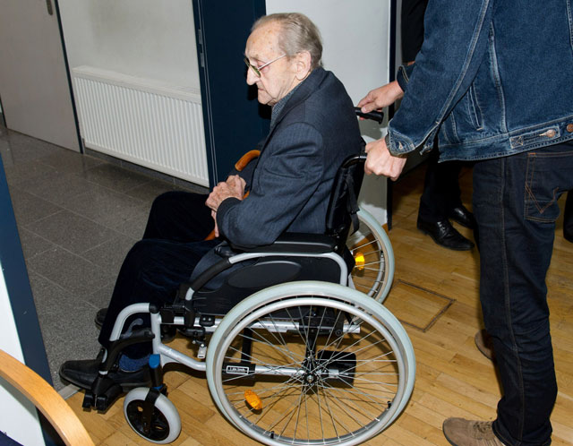 former ss medic hubert zafke 95 accused of aiding in 3 681 murders in auschwitz in 1944 arrives for the beginning of his trial on september 19 2016 at the court in neubrandenburg northeastern germany photo afp