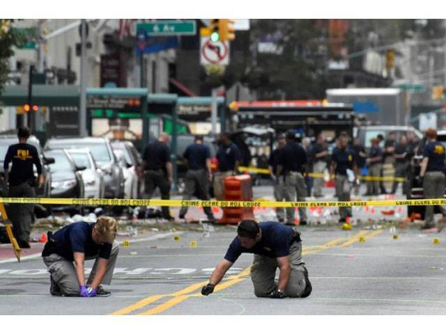 federal bureau of investigation fbi officials mark the ground near the site of an explosion in the chelsea neighborhood of manhattan new york us september 18 2016 photo reuters federal bureau of investigation fbi officials mark the ground near the site of an explosion in the chelsea neighborhood of manhattan new york us september 18 2016 photo reuters
