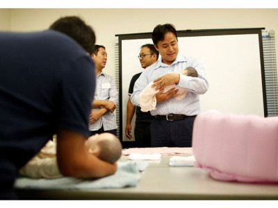 japanese bachelors learn the art of parenting to help find wives