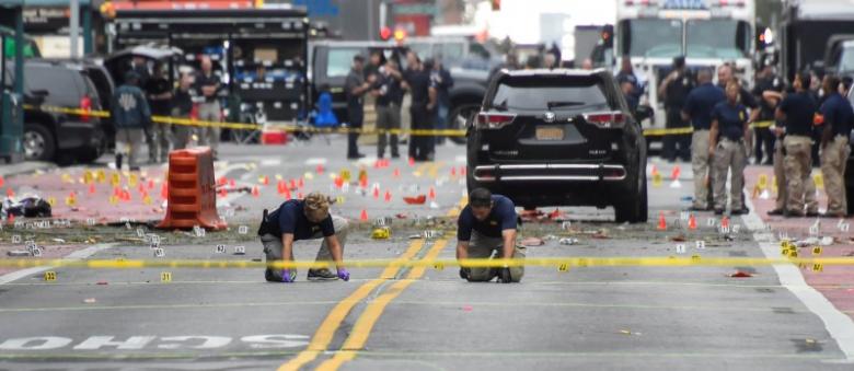 federal bureau of investigation fbi officials mark the ground near the site of an explosion in the chelsea neighborhood of manhattan new york u s september 18 2016 photo reuters