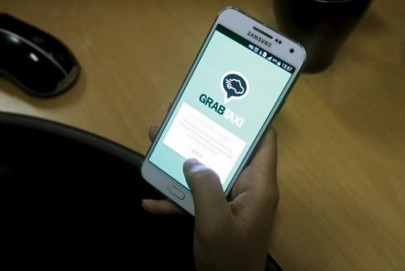ride hailing app grab raises 750 million in funding led by softbank ride hailing app grab raises 750 million in funding led by softbank