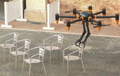 japanese firm unveils dual robot armed drone japanese firm unveils dual robot armed drone