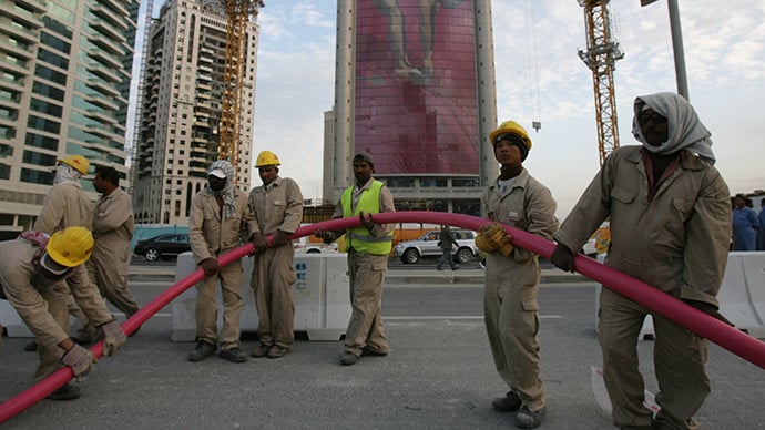 a file photo of workers in doha photo afp