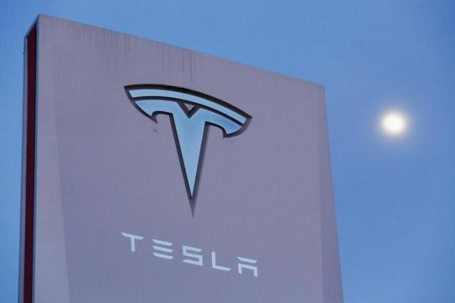 signage is displayed outside of tesla motors before the tesla energy powerwall home battery event in hawthorne california photo reuters signage is displayed outside of tesla motors before the tesla energy powerwall home battery event in hawthorne california photo reuters