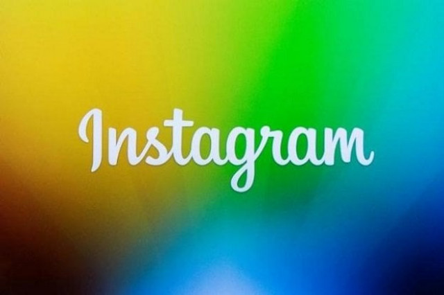 a screen displays the instagram logo photo reuters