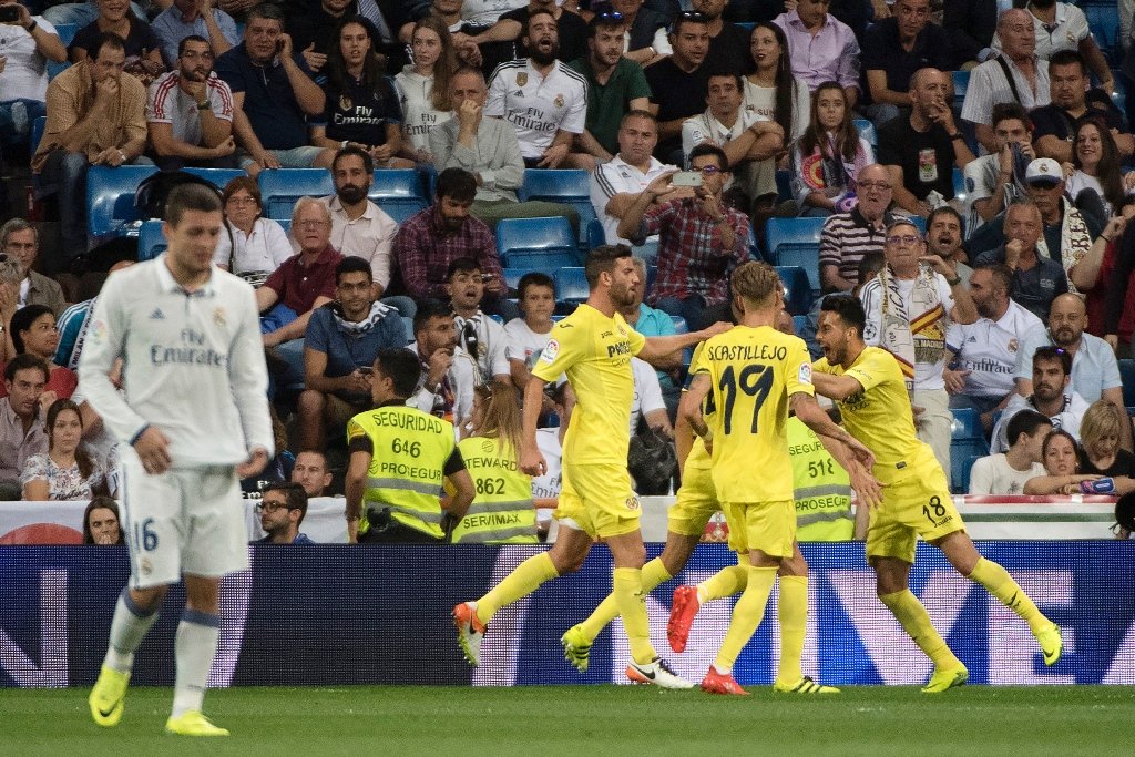 villarreal 039 s players celebrate a goal against real madrid at the santiago bernabeu stadium in madrid on september 21 2016 photo afp