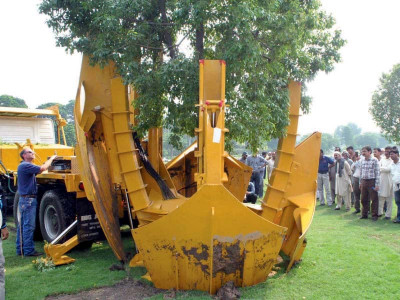 keeping roots intact in a first lahore gets a tree spade keeping roots intact in a first lahore gets a tree spade