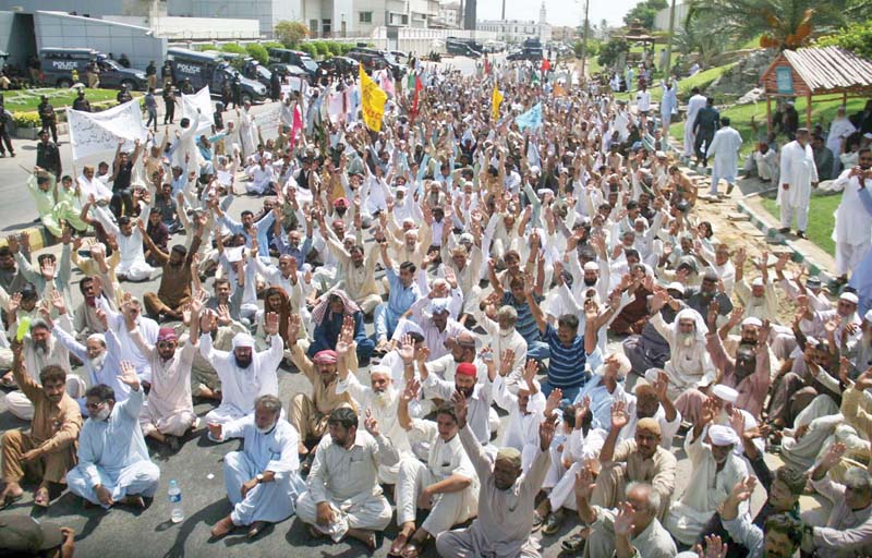 a large number of sacked employees of the then kesc protest outside the head office of k electric photo online