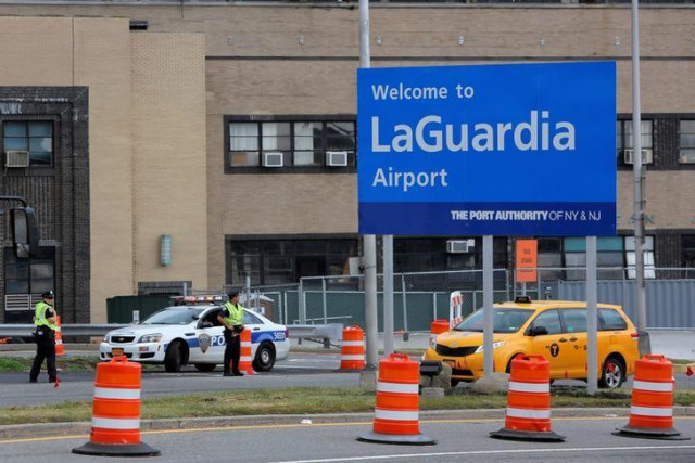 port authority police monitor the entrance to laguardia airport in the lead up to the holiday weekend in the queens borough of new york us photo reuters port authority police monitor the entrance to laguardia airport in the lead up to the holiday weekend in the queens borough of new york us photo reuters