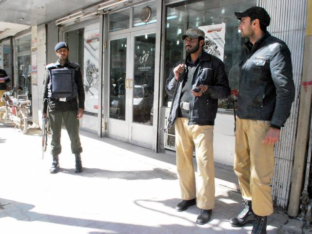 a file photo of police personnel standing guard in quetta