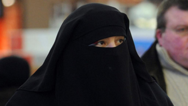 a woman wearing a burka photo reuters a woman wearing a burka photo reuters