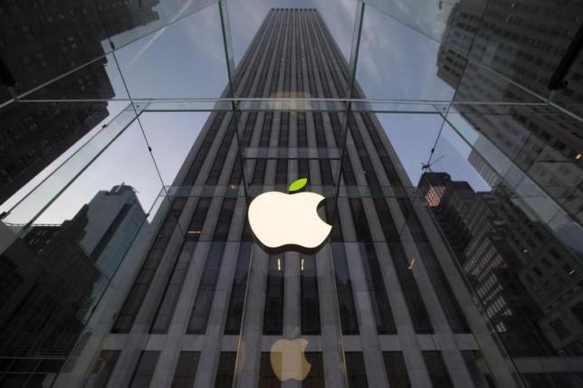 the leaf on the apple symbol is tinted green at the apple flagship store on 5th ave in new york april 22 2014 photo reuters