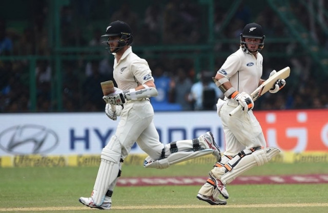 new zealand 039 s tom latham r and captain kane williamson run between the wickets during the second day of the first test match between india and new zealand at green park stadium in kanpur on september 23 2016 photo afp