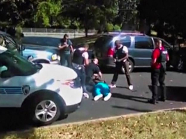 keith scott lies on the ground after being fatally shot by police in charlotte north carolina us in this still image taken from video received by reuters september 23 2016 photo reuters keith scott lies on the ground after being fatally shot by police in charlotte north carolina us in this still image taken from video received by reuters september 23 2016 photo reuters