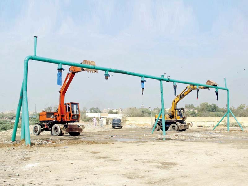 an illegal hydrant being demolished in january this year during an anti encroachment drive by the kwsb photo file