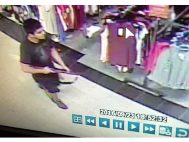 a screen grab from a security video shows the suspect who killed five in the cascade mall in burlington washington photo reuters