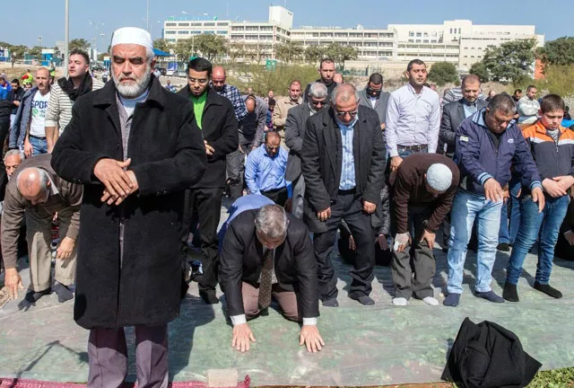 file photo of an israeli muslim cleric leading prayer in support for the release of mohammed al qiq a palestinian prisoner on hunger strike photo afp file photo of an israeli muslim cleric leading prayer in support for the release of mohammed al qiq a palestinian prisoner on hunger strike photo afp