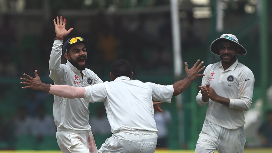 india 039 s captain virat kohli l and ravindra jadeja r celebrate as mohammed shami c successfully appeals for an lbw decision against new zealand 039 s b j watling during the fifth day of the first cricket test match between india and new zealand at green park stadium in kanpur on september 26 2016 photo afp