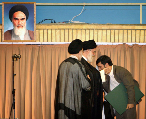 iranian president mahmoud ahmadinejad r kisses the hand of supreme leader ayatollah ali khamenei c after receiving a certificate declaring him as president of the islamic republic as outgoing president mohammad khatami looks on in tehran august 3 2005 photo reuters iranian president mahmoud ahmadinejad r kisses the hand of supreme leader ayatollah ali khamenei c after receiving a certificate declaring him as president of the islamic republic as outgoing president mohammad khatami looks on in tehran august 3 2005 photo reuters