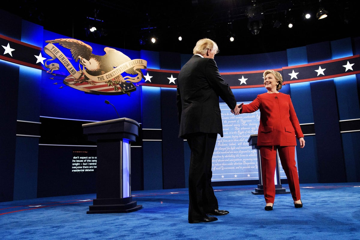 republican presidential nominee donald trump l and democratic presidential nominee hillary clinton greet each other before the first us presidential debate at hofstra university september 26 2016 in hempstead new york photo afp