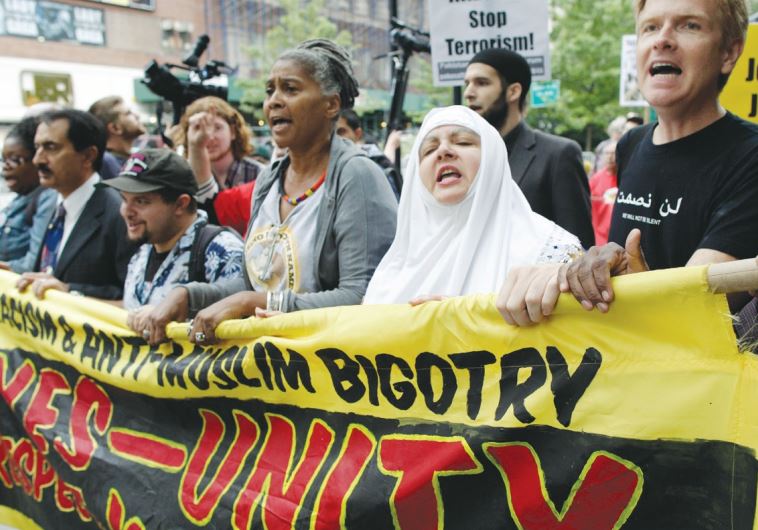 protesters march in the rally against war racism and islamophobia held on september 11 2011 on the 10th anniversary of the 9 11 attack on the world trade center photo reuters