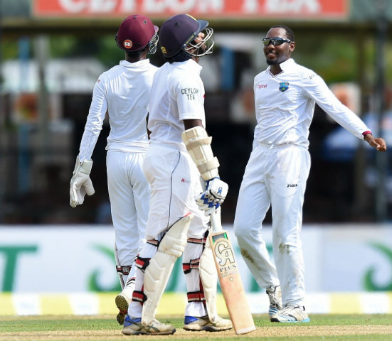 jomel warrican r is included in west indies squad for three match series against pakistan in the uae photo afp jomel warrican r is included in west indies squad for three match series against pakistan in the uae photo afp