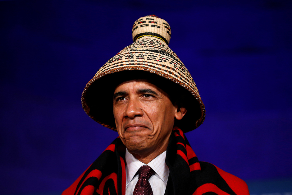 president barack obama looks up as is honored in a blanketing ceremony before speaking at the white house tribal nations conference in washington photo reuters