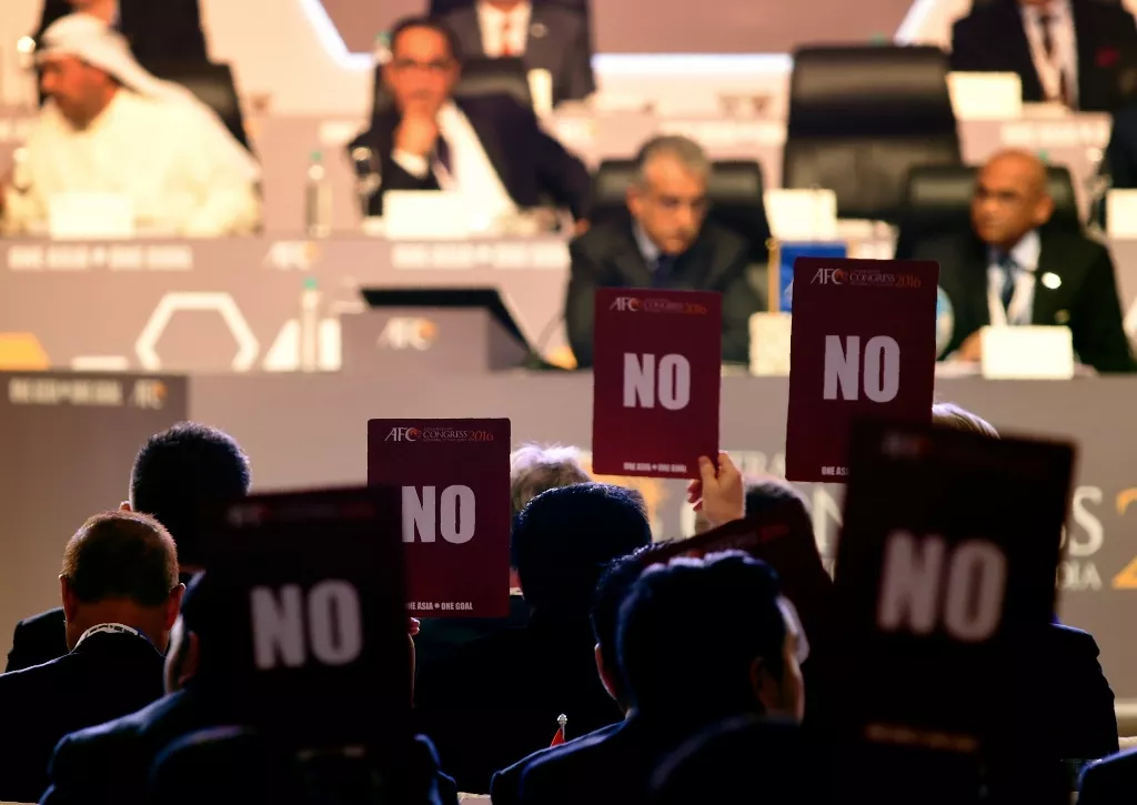 members of the asian football confederation afc hold up 039 no 039 voting cards in goa on september 27 2016 photo afp members of the asian football confederation afc hold up 039 no 039 voting cards in goa on september 27 2016 photo afp