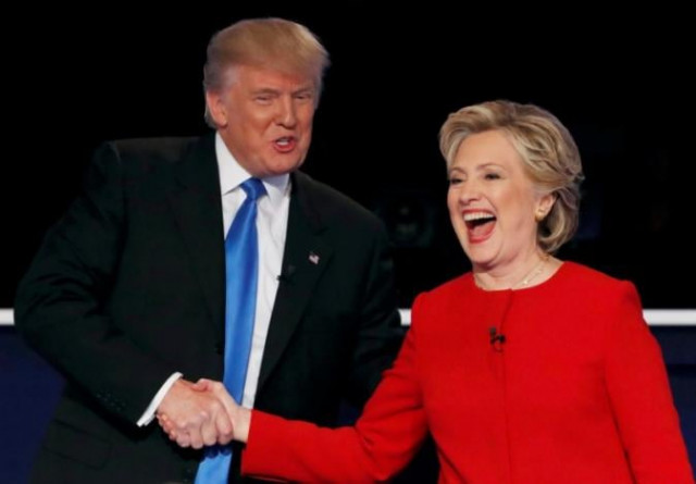 donald trump shakes hands with hillary clinton at the conclusion of their first presidential debate photo reuters donald trump shakes hands with hillary clinton at the conclusion of their first presidential debate photo reuters