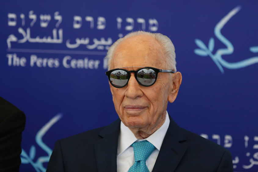 this file photo taken on may 9 2016 shows former israeli president shimon peres looking on during the opening of the quot mini world cup for peace quot football event at the herzlyia stadium in the israeli city of herzlyia near tel aviv photo afp