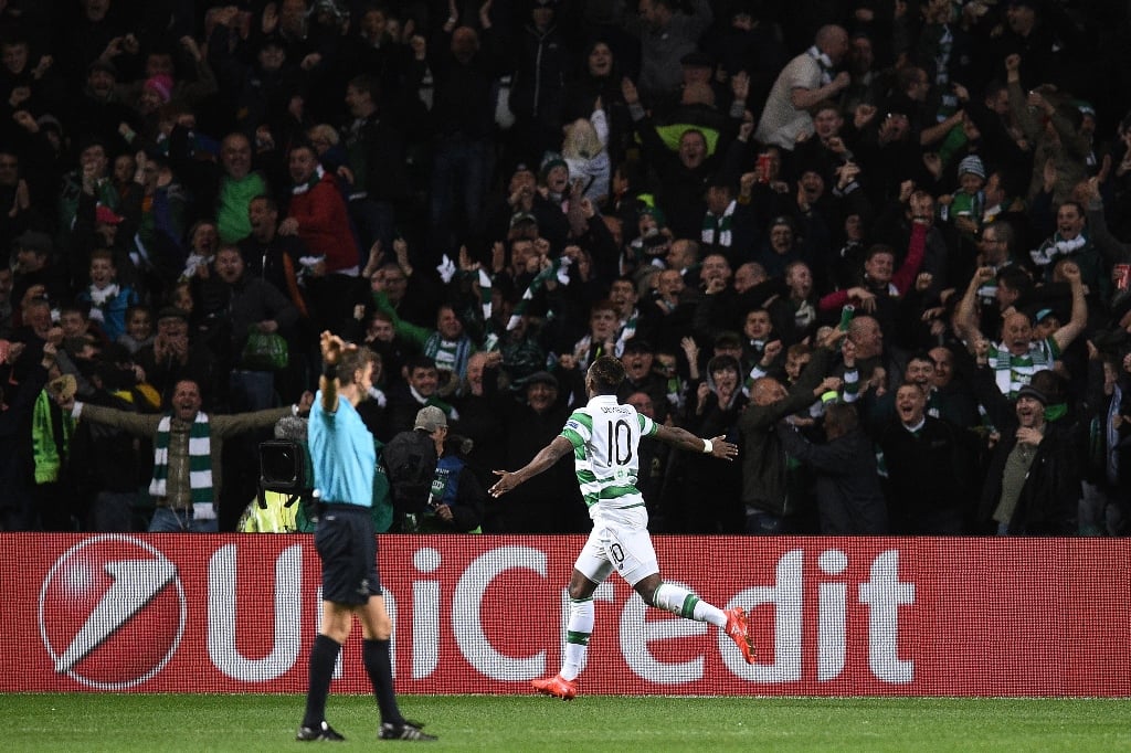 moussa dembele celebrates scoring his team 039 s third goal in glasgow on september 28 2016 photo afp