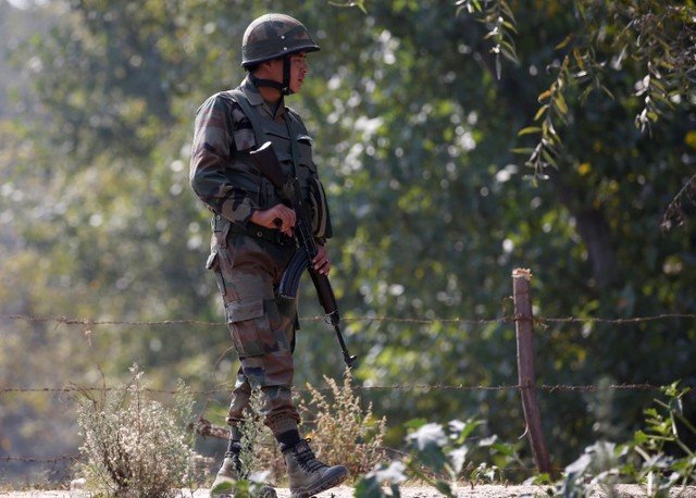 an indian army soldier patrols along a highway on the outskirts of srinagar september 29 2016 photo reuters