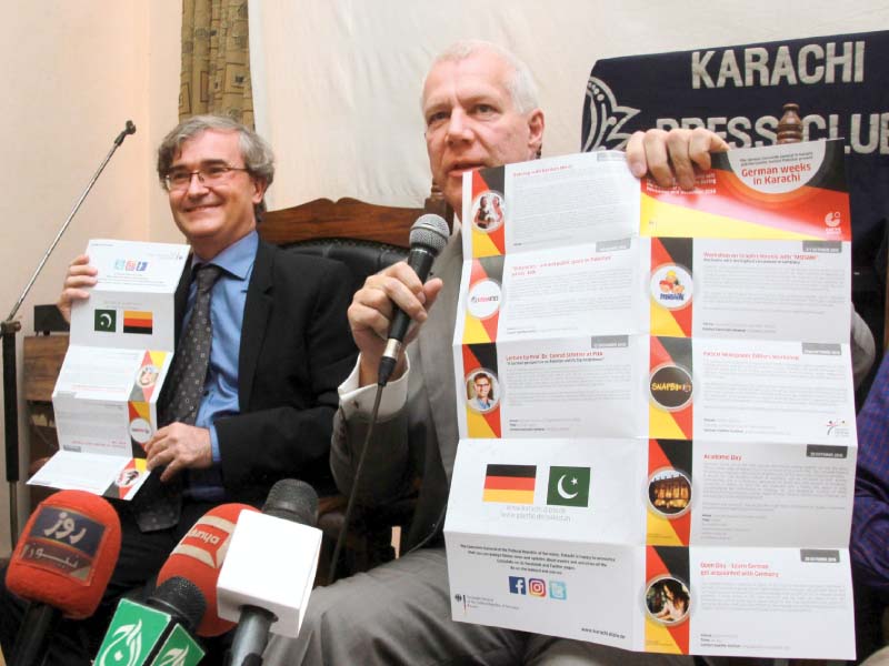 goethe institut director stefan winkler and german consul general rainer schmiedchen present the schedule of the events that will be part of the german weeks photo athar khan express