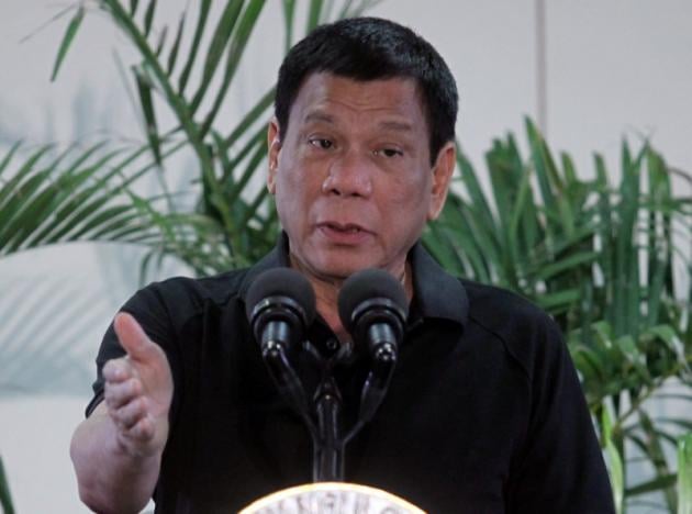 philippines president rodrigo duterte gestures during a news conference upon his arrival from a state visit in vietnam at the international airport in davao city philippines photo reuters